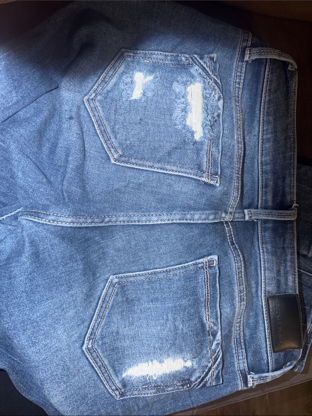 Buckle Women’s Distressed Blue Jeans